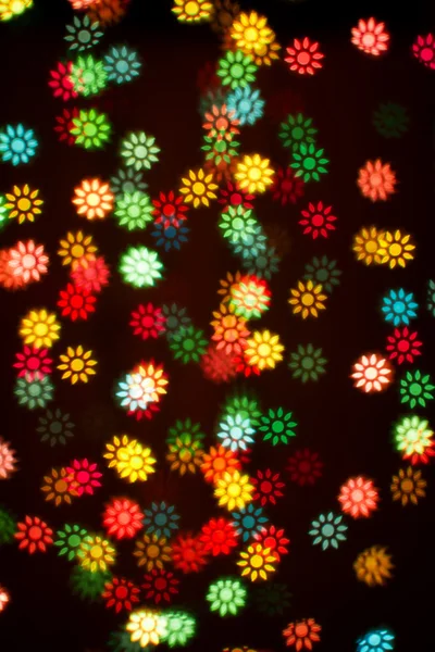 Luces borrosas fondo bokeh de flores de colores — Foto de Stock