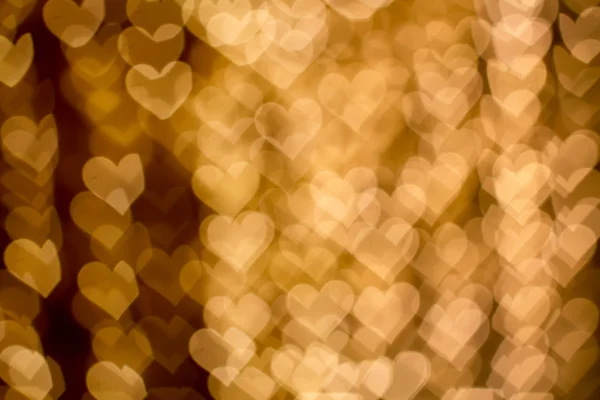 Blurring lights bokeh background of hearts — Stock Photo, Image