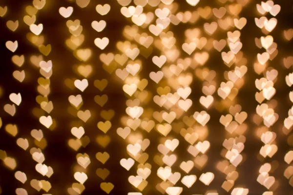 Blurring lights bokeh background of hearts — Stock Photo, Image