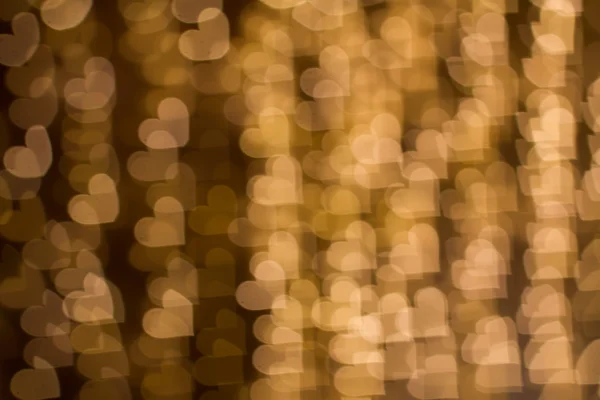 Blurring lights bokeh background of hearts — Stock Photo, Image