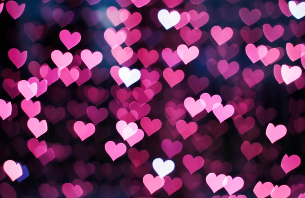 Blurring lights bokeh background of pink hearts — Stock Photo, Image