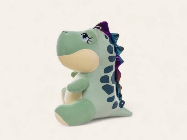 Şirin Yeşil Dinozor peluş Oyuncak Arka planda Oturuyor