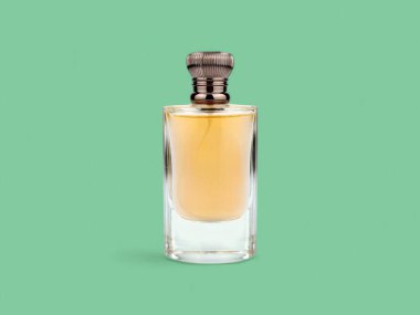Zarif bir cam parfüm şişesi.