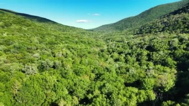 Aerial drone video footage of summer time in the Catskill Mountains in New Yorks Hudson Valley. The Catskills are a sub-range of the Appalachian Mountains on the east coast of the United States.