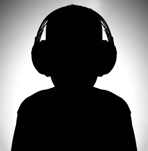 Černobílý Obraz Silueta Chlapce Sluchátky Poslech Hudby — Stock fotografie