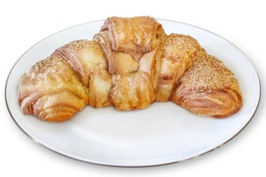 Kruvasan puf böreği rulo izole beyaz porselen tabak içinde