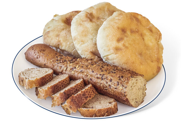 Baguette Integral Bread Cut In Slices With Three Pita Bread Loafs Isolated