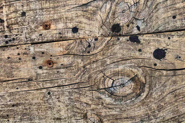 Gamla knuten knäckt grov texturerat brädan detalj — Stockfoto