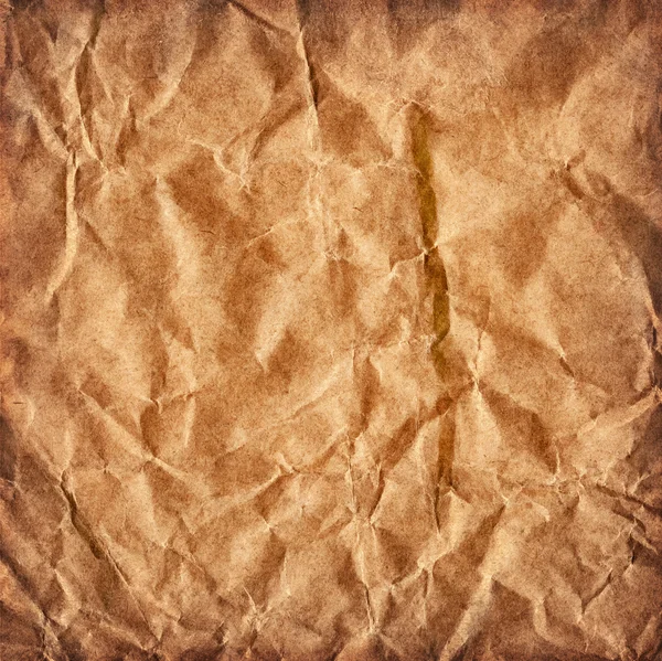 Riciclare ocra-marrone carta Kraft grossolana schiacciato grunge sgualcito Texture — Foto Stock