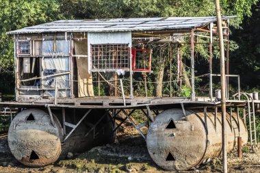 Old Stranded Scrapped Abandoned Summer Leisure Raft Shack on Sava River