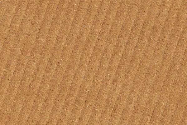 Reciclar amostra de textura de grunge de papelão marrom ondulado — Fotografia de Stock