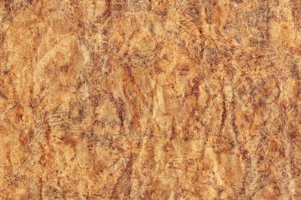 Reciclar papel Kraft marrón arrugado textura grunge moteada — Foto de Stock