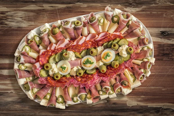 Plateful of Appetizer Meze Placed on Very Old Weathered Wooden Table — Zdjęcie stockowe