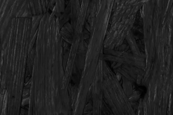 Отбеленная и отделанная древесным углем черная отбеленная грубая текстура — стоковое фото