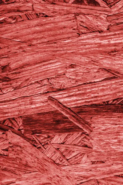 Panneau de particules blanchies et teintes rouges texture grossière grunge — Photo