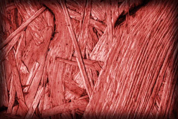 Spanplatten gebleicht und rot gefärbt grobe Vignette Grunge Textur — Stockfoto