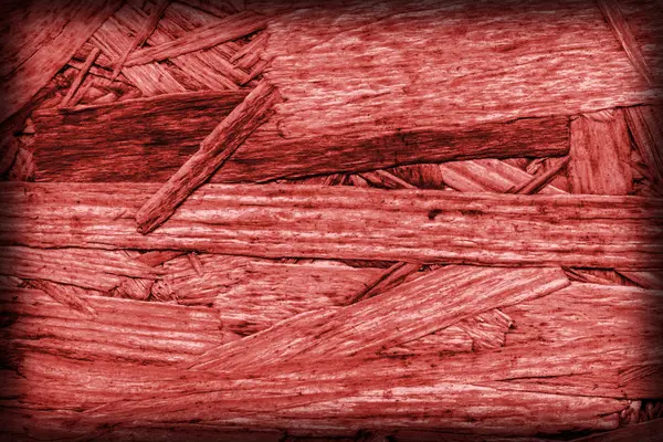 Spanplatten gebleicht und rot gefärbt grobe Vignette Grunge Textur — Stockfoto