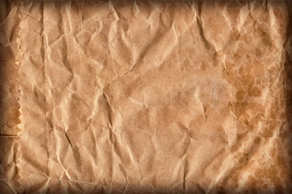 Recyklovat hnědé Kraft papírový sáček drcené hrubé zrno zmačkaný Vignette Grunge textury Detail — Stock fotografie