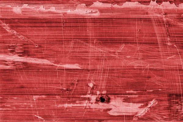 Eski ahşap Lamine paneli kırmızı vernikli lekeli tırmalamak soyulmuş Grunge doku kırık