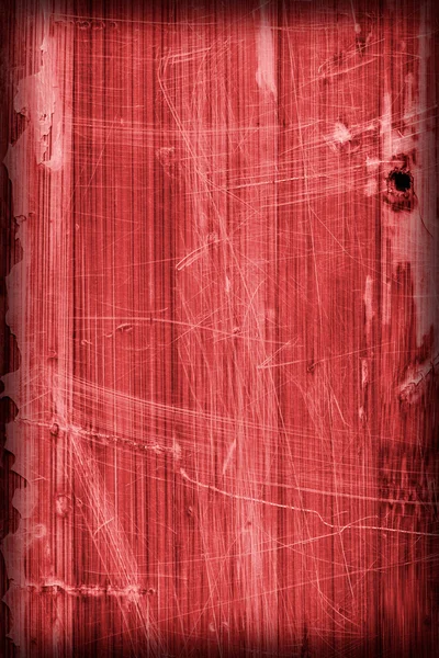 Oude houten gelaagd paneel rood gekleurd gelakte gekraakt bekrast gepelde vignet Grunge textuur — Stockfoto