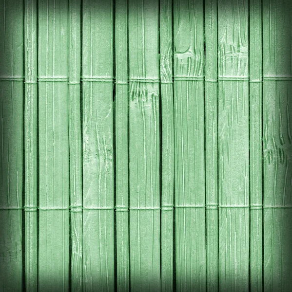 Tapis de bambou blanchi et teint Vignette verte pâle Échantillon de texture grunge — Photo