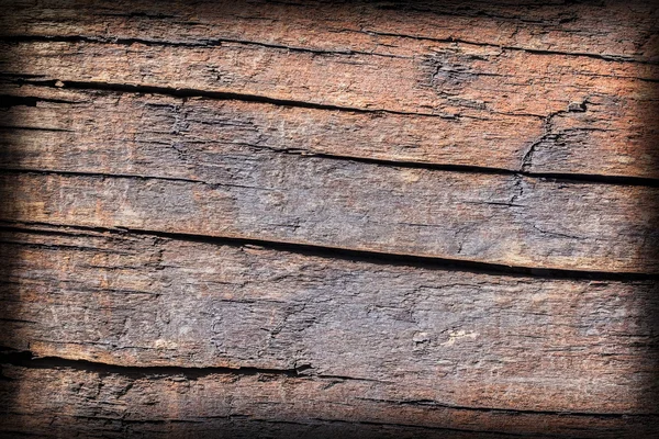 旧広場木材ボラード腐って風化割れたアスファルト ビネット グランジ テクスチャ — ストック写真