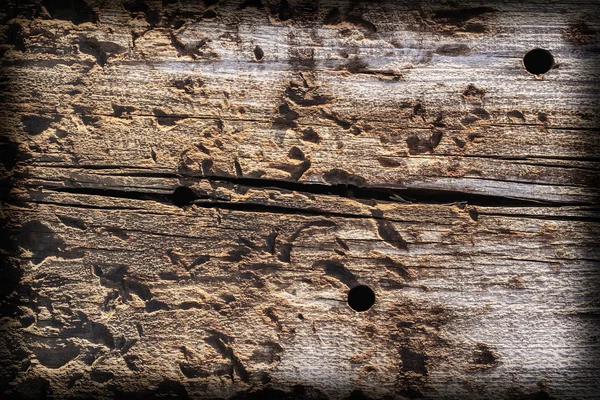 Velho quadrado madeira Bollard Weathered podre rachado betuminoso Grunge superfície textura — Fotografia de Stock