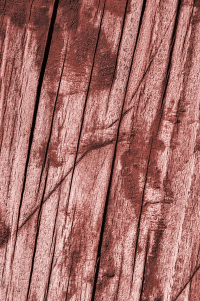 Starý zvětralý shnilé popraskané dřevo natřeny červenou Grunge drsnosti — Stock fotografie