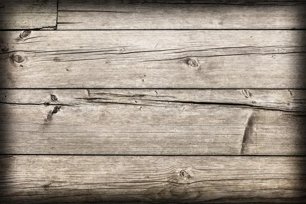 Starý zvětralý popraskané shnilé dřevěné palubky Vignette Grunge textury — Stock fotografie