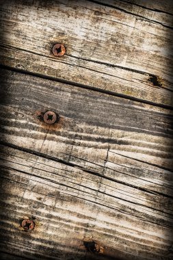 Eski kırık çürük ahşap döşemeler Vignette doku gömülü Rusty vida ile yıpranmış