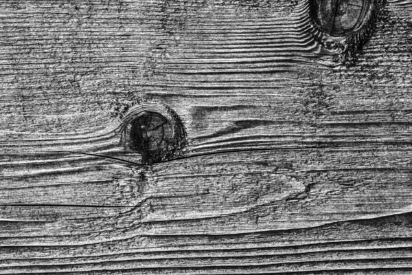 Vecchio nodo legno intemperie sbiancato e macchiato grigio scuro Grunge Texture — Foto Stock
