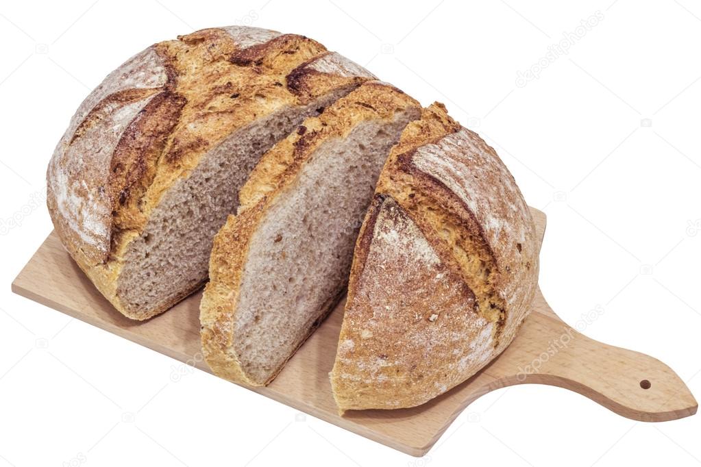 Monastery Bread Loaf Sliced on Wooden Cutting Board Isolated on White Background