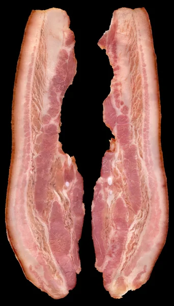 Barriga de porco Bacon Rashers isolado em fundo preto — Fotografia de Stock