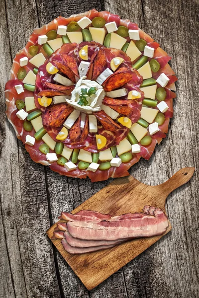 Appetizer Savory Dish Meze with Bacon Rashers on Old Wood Background — Stock Photo, Image
