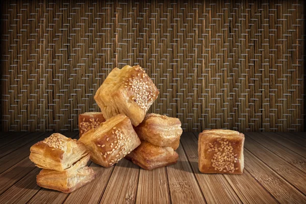 Manojo de Zuzu Square Puff Croissant pastelería en bambú Place Mat — Foto de Stock
