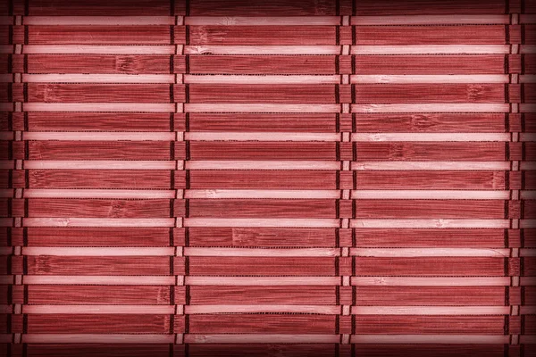 Muestra de textura de grunge de viñeta roja de estera de bambú — Foto de Stock