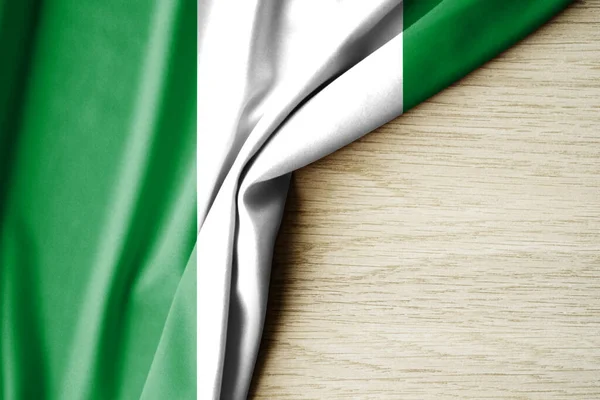 Nigeria flag. Fabric pattern flag of Nigeria. 3d illustration. with back space for text. Close-up view.