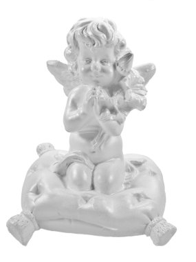 Porselen melek, bir yastık üzerinde oturan