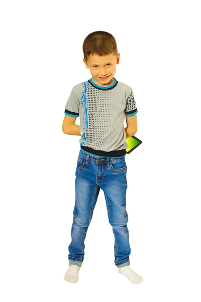 Jongen met een tablet met een sluwe blik — Stockfoto