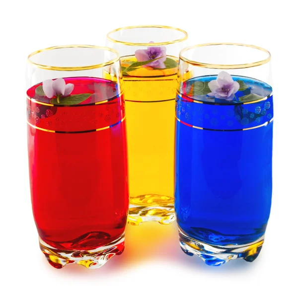 Boire trois couleurs et fleurs, la triade de rouge, jaune et blu — Photo