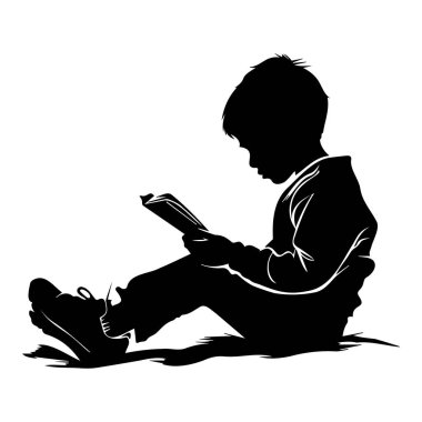 Silhouette of a Young Boy Reading a Book on the Floor in a Calm and Thoughtful Atmosphere for Creative Projects