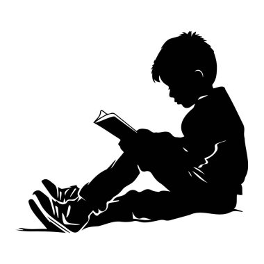 Silhouette of a Young Boy Sitting on the Floor Engrossed in a Book, Capturing the Joy of Reading and Imagination