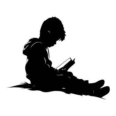 Silhouette of a Young Boy Sitting on the Ground and Reading a Book in a Calm and Peaceful Atmosphere