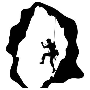 A brave rock climber skillfully navigates a dark cave, showcasing the thrill of adventure and the challenge of exploring rugged terrain.