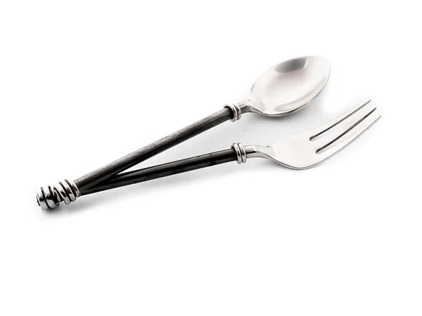 Cuchara y tenedor, Colocado sobre fondo blanco — Foto de Stock