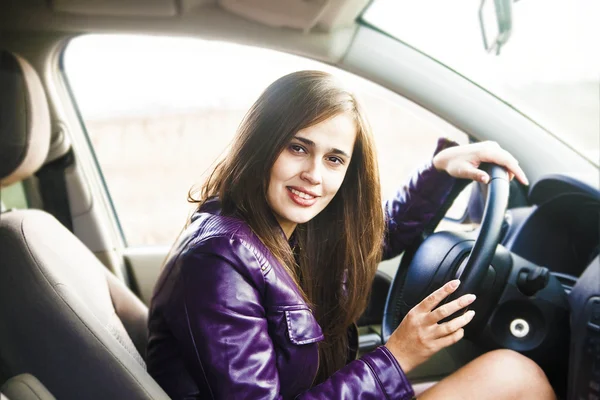 Beautiful woman in car Stock Image