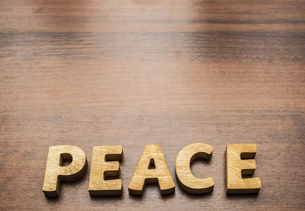 Peace made from wooden letters — Stock Photo, Image