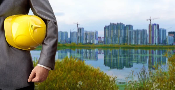 Engineer holding yellow — Stock Photo, Image