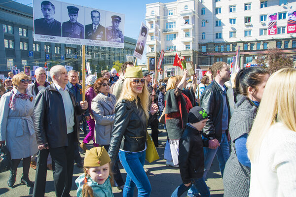 many people involved in the parade 