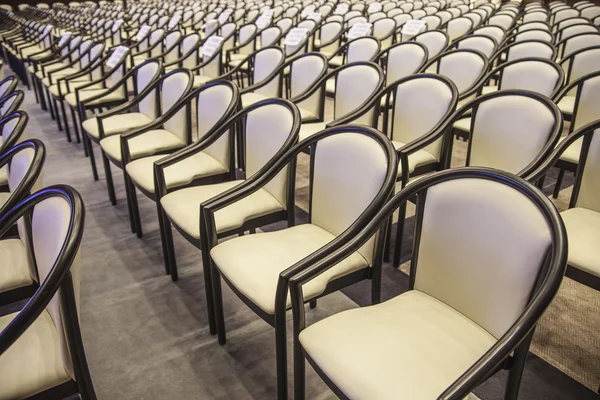 Rows of beige seats — Stock Photo, Image
